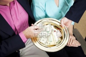8240772-church-receives-donations-by-passing-the-collection-plate